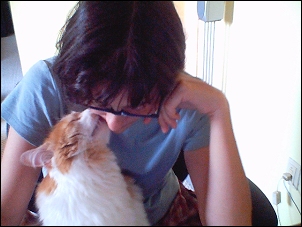 Rollie sucking up to me because I locked him in the bathroom.